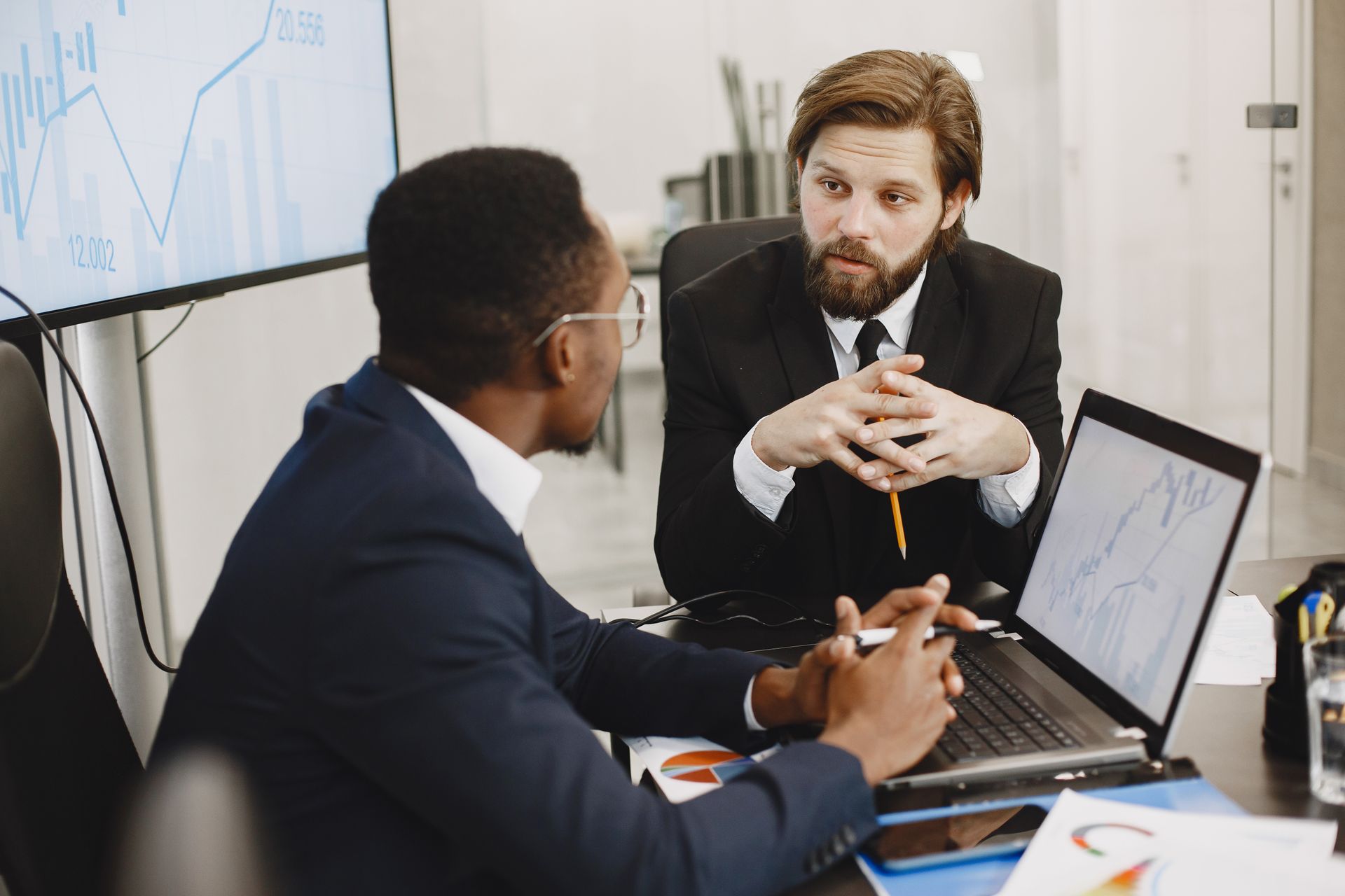 Professionals discussing a project during a meeting